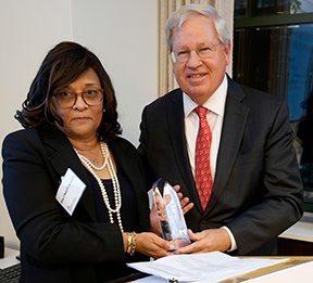 Foundation President Justice Cheryl E. Chambers presenting the Force for Justic Award to Stephen P. Younger.